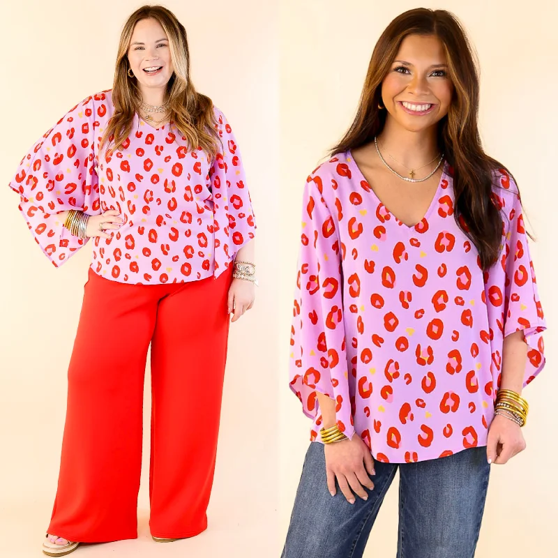Radiant Glow V Neck Leopard Print Top with Flowy Sleeves in Purple Trendy Women's Oversized Radiant Glow V Neck Leopard Print Top with Flowy Sleeves in Purple Trendy Women's Oversized
